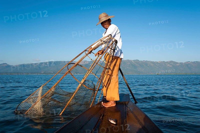 Fishermen with a traditional basket