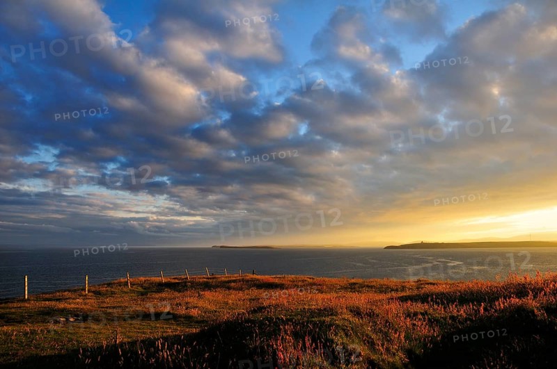 Atmospheric clouds at sunset near Hoxa Head