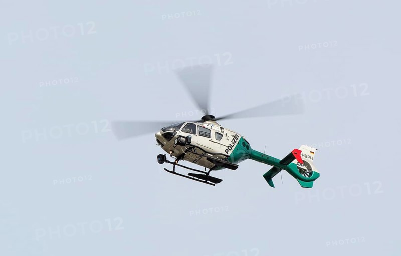EC135 police Eurocopter in the air at Munich Airport