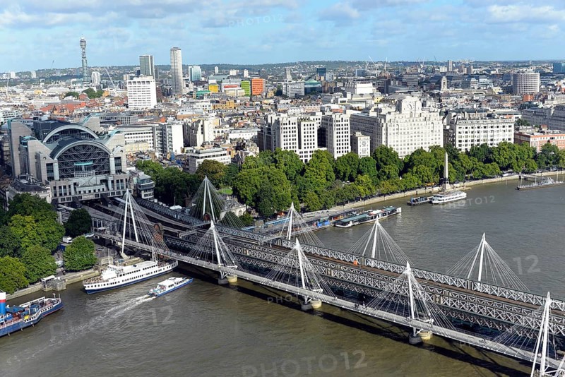 Hungerford Bridge over the River Thames with Charing Cross Station