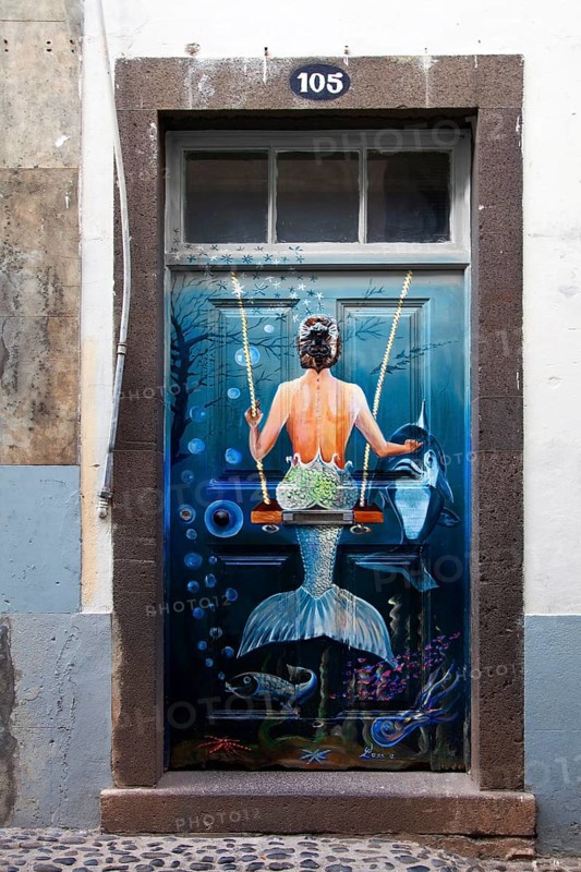 Mermaid on a swing
