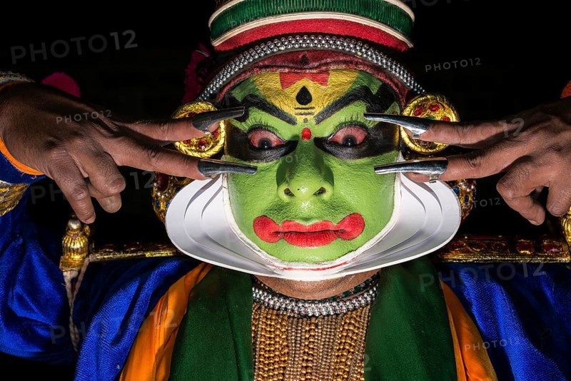 A Katakali with the complete make up of the character Krishna for the Santhana Gopalam play during a temple festival