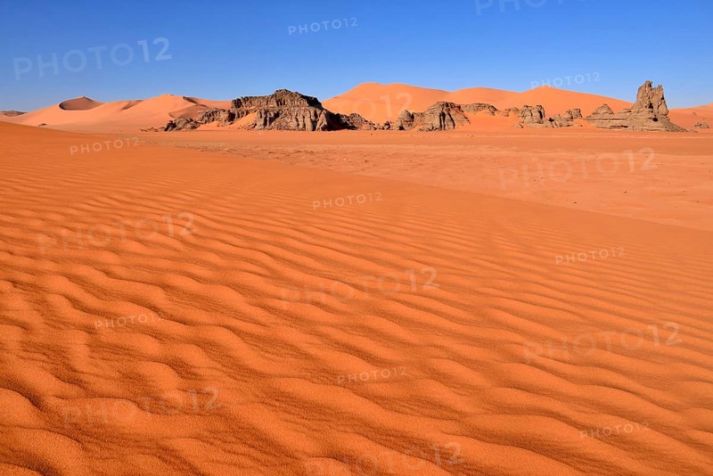 Sand dunes and rocks at Tin Merzouga