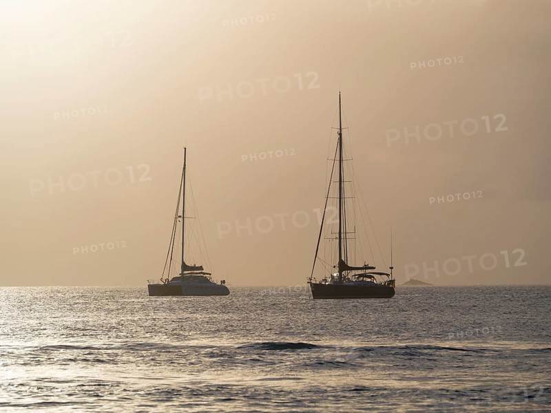 Sailing yachts at twilight near Rodney Bay