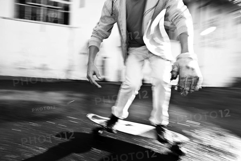 Skateboarder riding a longboard