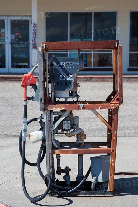 Abandoned gasoline pump at a closed General Store
