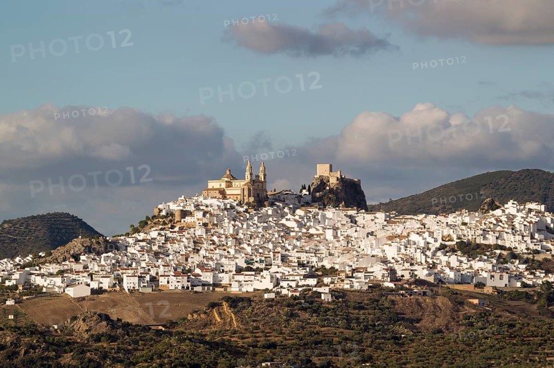 The hilltop White Town of Olvera with La Encarnacion church and the Moorish castle