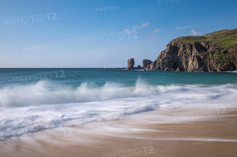 Waves break on the beach of Dalmore