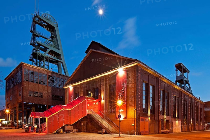 Zeche Ewald colliery with the Revuepalast Ruhr at dusk