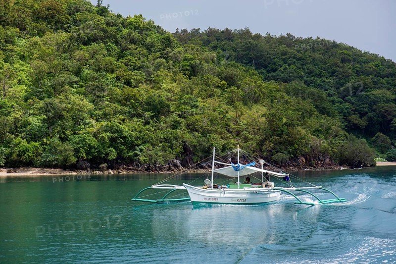 Traditional outrigger boat on the sea