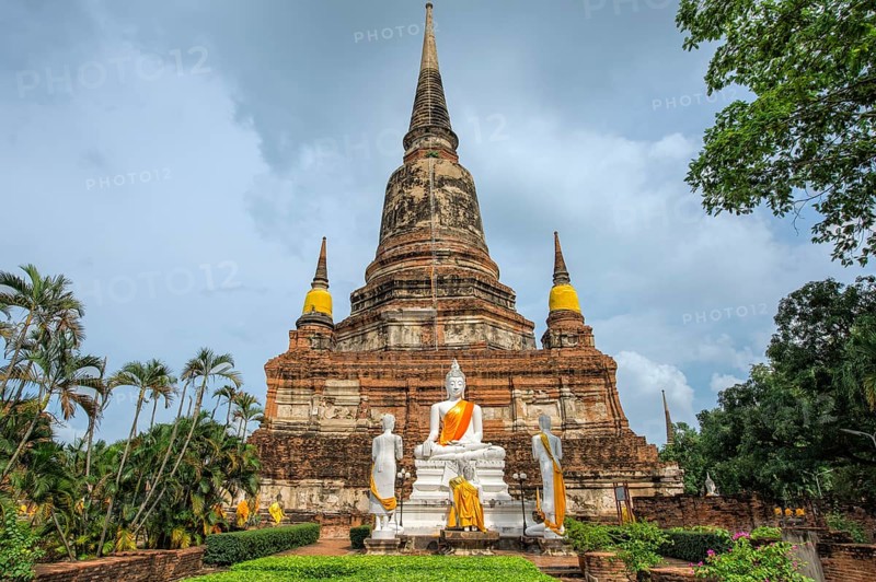 Buddha statues in front of the stupa at Wat Yai Chai Mongkhon