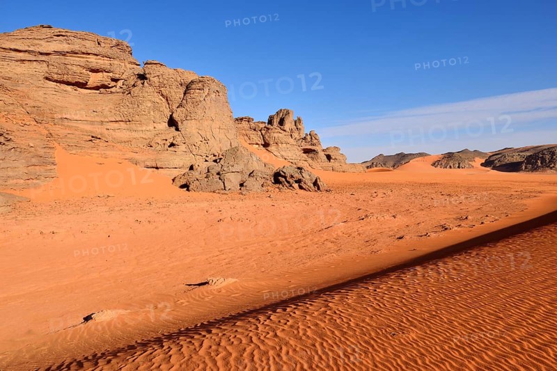 Sand dunes and rocks at Tin Merzouga