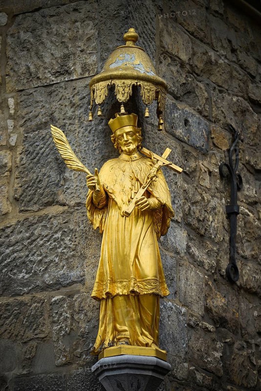 Statue of Saint Nepomuk at the corner of a house