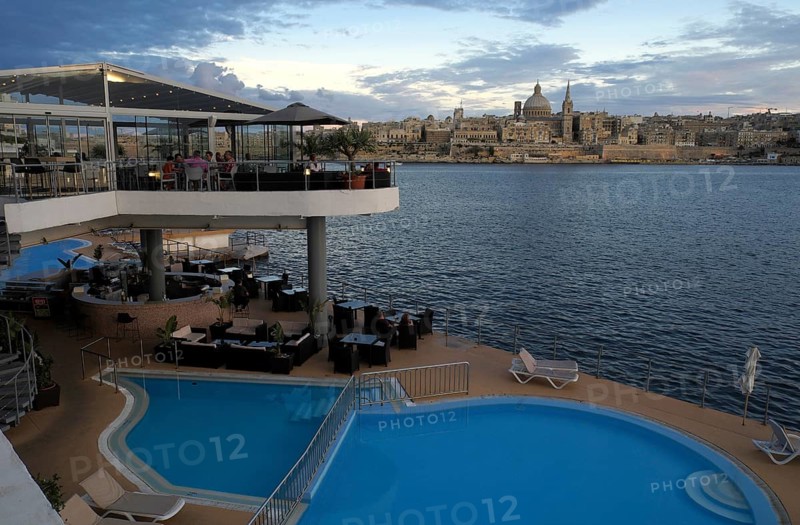 Terrace and pool of Fortina Hotel