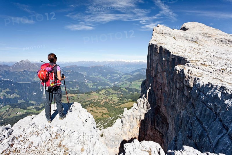 Climber on the Kreuzkofelscharte at the ascend up to Heiligkreuzkofel over the Heiligkreuzkofelsteig via ferrata in the Fanes group in the Fanes-Senes-Prague