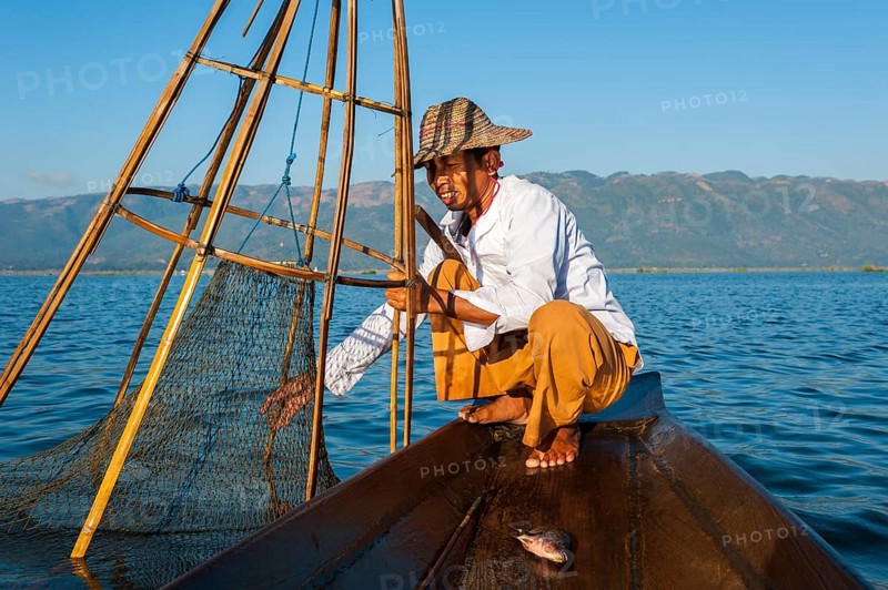 Fishermen with a traditional basket