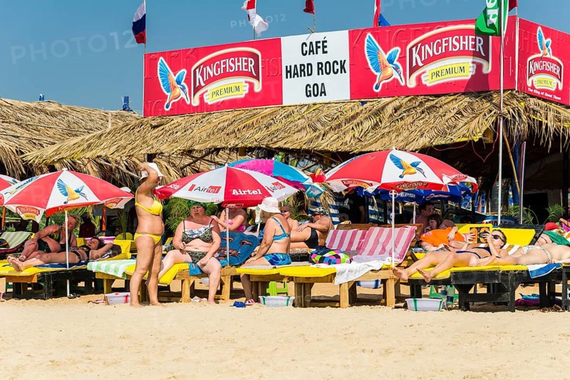 Tourists on the beach in front of Cafe Hard Rock Goa