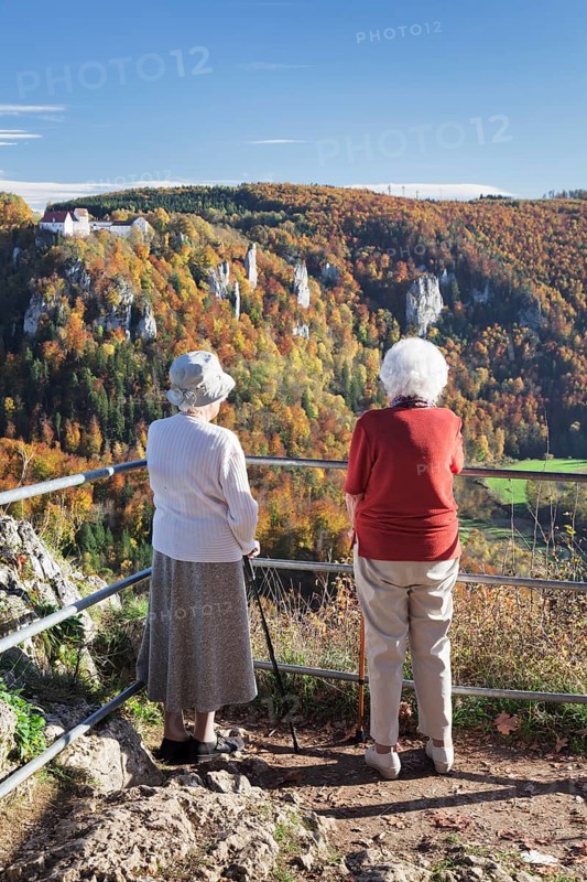 Two elderly ladies looking at the view over Danube Gorge from Burg Wildenstein Castle