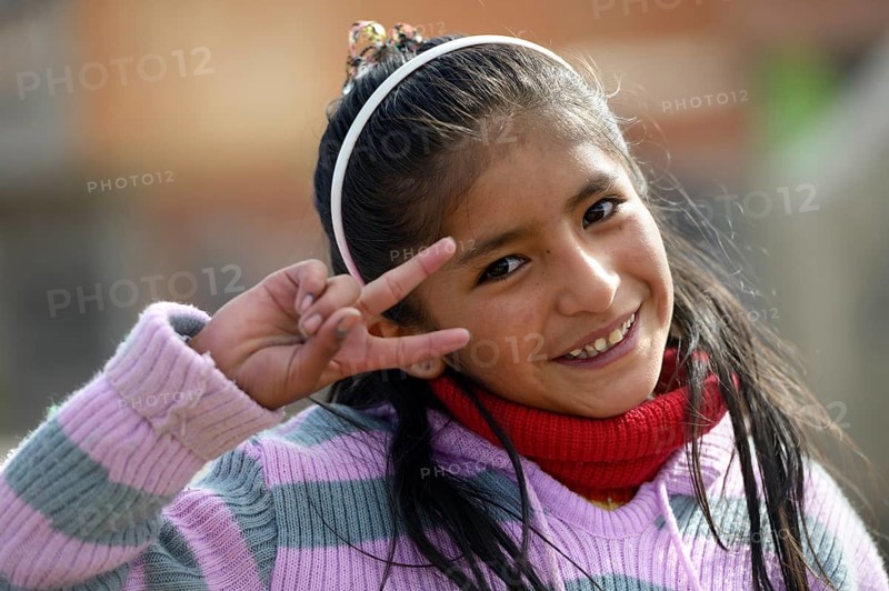 Girl making the victory sign
