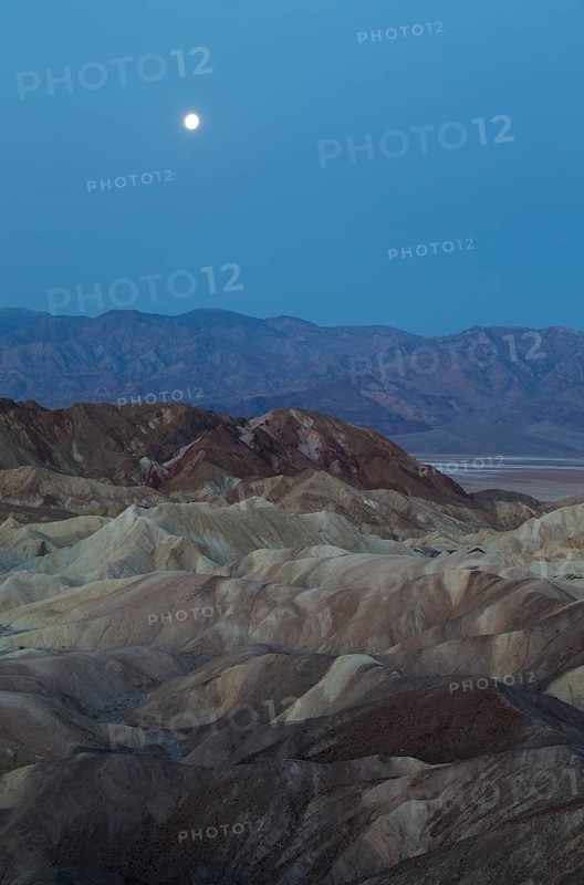 Full moon over the Panamint Range and the Death Valley at dawn