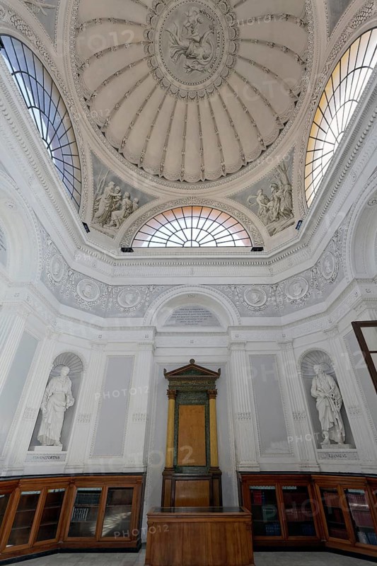 Lecture hall with statues of scientists