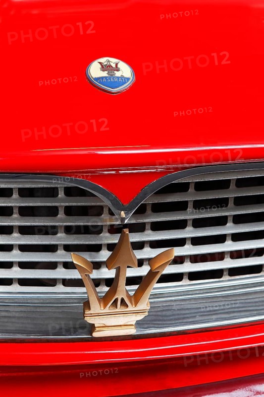 Maserati logo and emblem of trident on a car