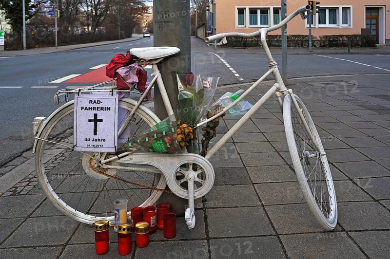 White bicycle with candles