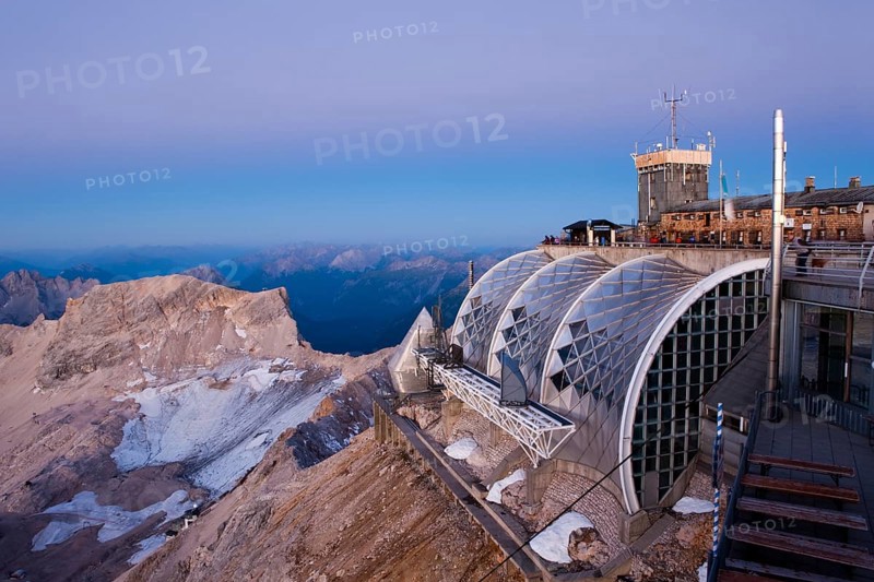 Summit plateau of Mt Zugspitze with a terrace and Munchner Haus mountain hut