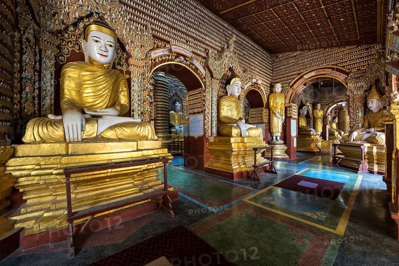 Seated and standing Buddha statues
