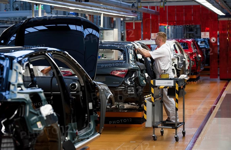 Man working on the production line of the Audi A3 at the Audi plant