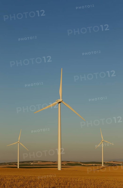 Windmills in the evening light on a wind farm near Sanlucar de Barrameda