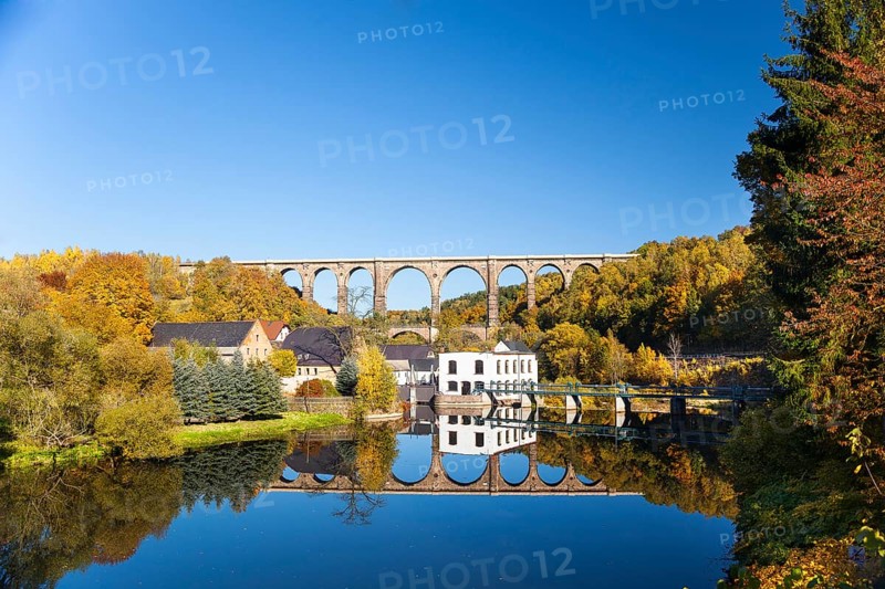 Gohren railway viaduct with reflections in the Zwickauer Mulde river