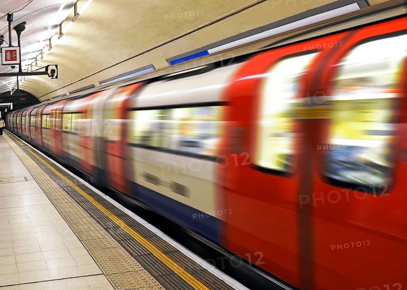 London underground train leaving Charing Cross station