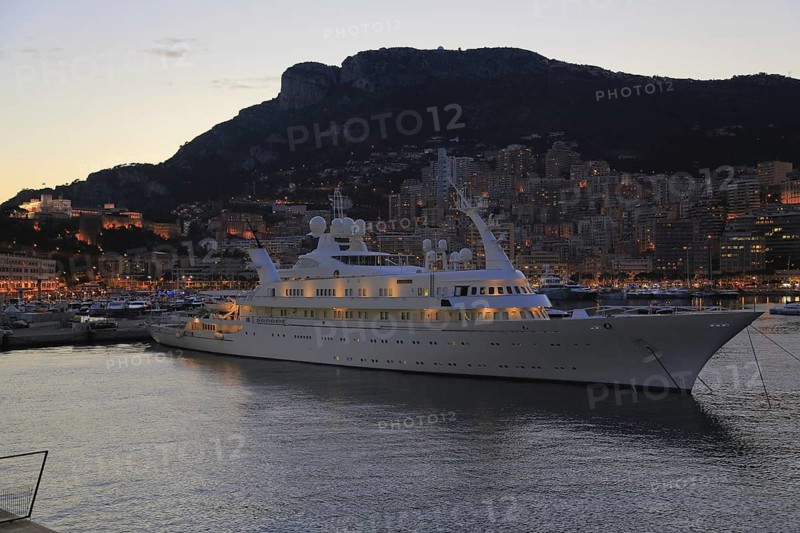 Motor yacht Atlantis II in the evening in Port Hercule