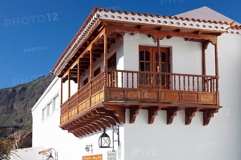 House with traditional wooden balcony