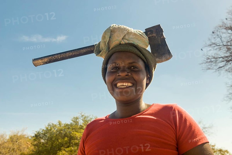 Woman wearing ax on her head