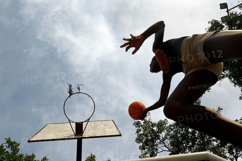 Youth making a layup in basketball
