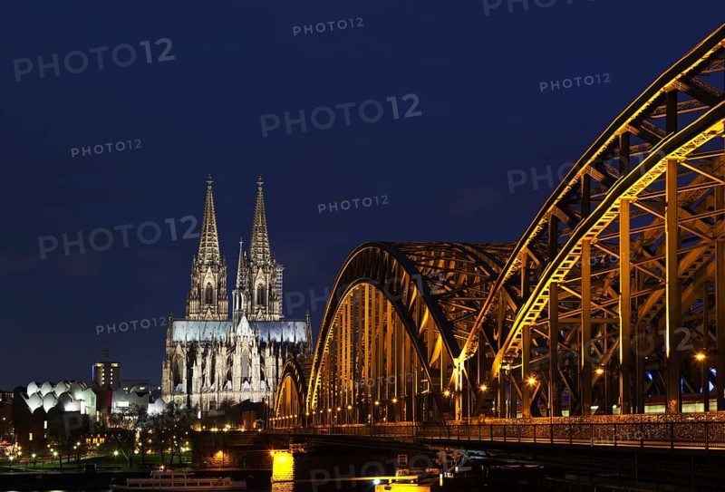 Hohenzollern Bridge with Cologne Cathedral at dusk