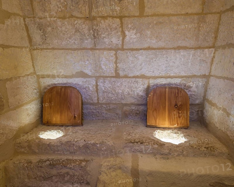 Simple medieval toilet in the Castillo de Belmonte castle