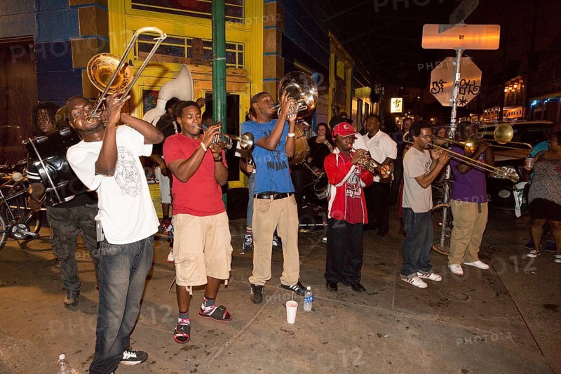 Teenagers with wind instrumets busking