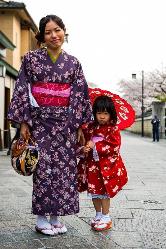 Traditionally dressed mother and daughter