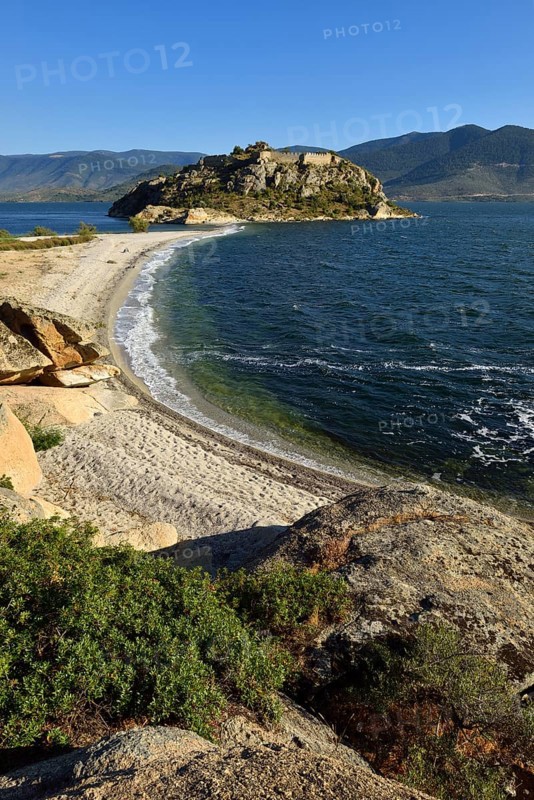 Island with castle on the north shore of Bafa Lake Nature Park