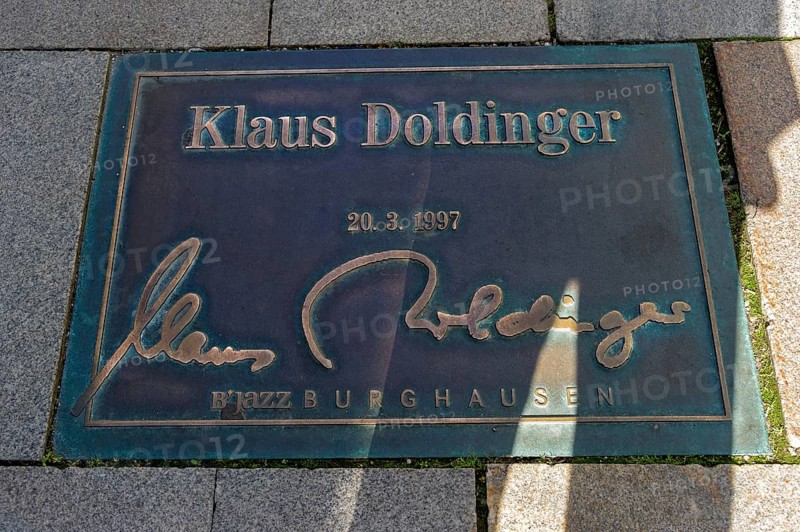 Plaque for the jazz musician Klaus Doldinger in the pavement of the 'Street of Fame'