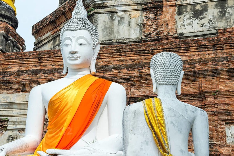 Buddha statues in front of the stupa at Wat Yai Chai Mongkhon