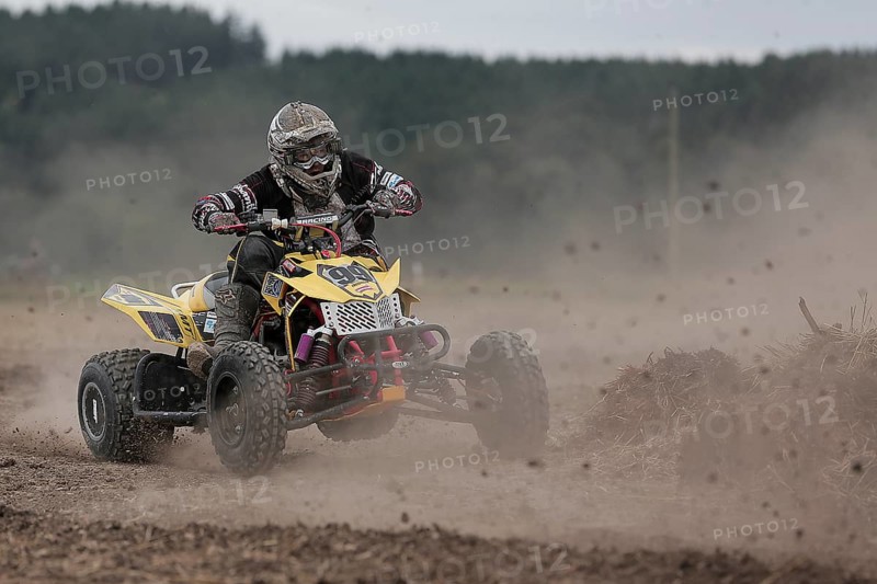 Quad rider on a field