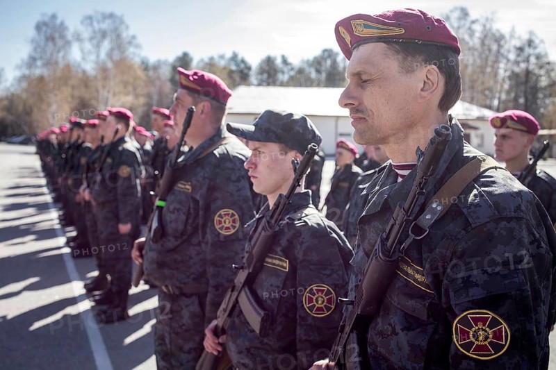 Swearing-in ceremony of volunteers after a three-week military training