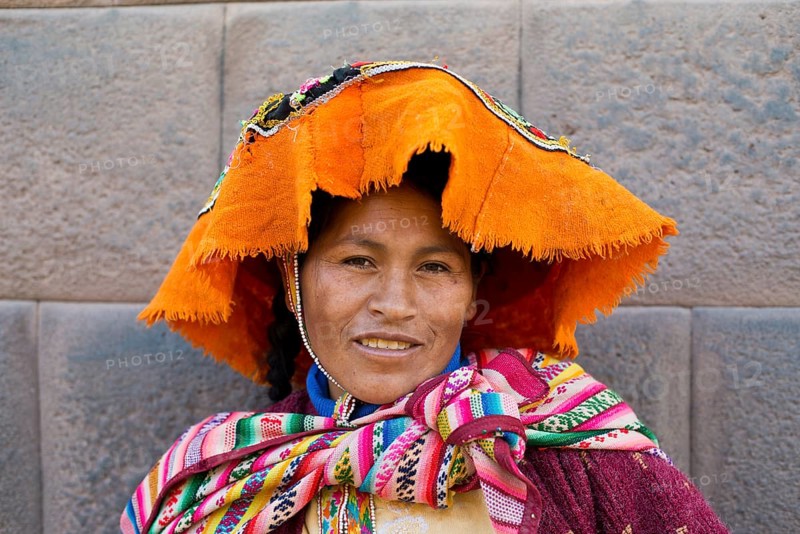 Smiling woman with headscarf and sling