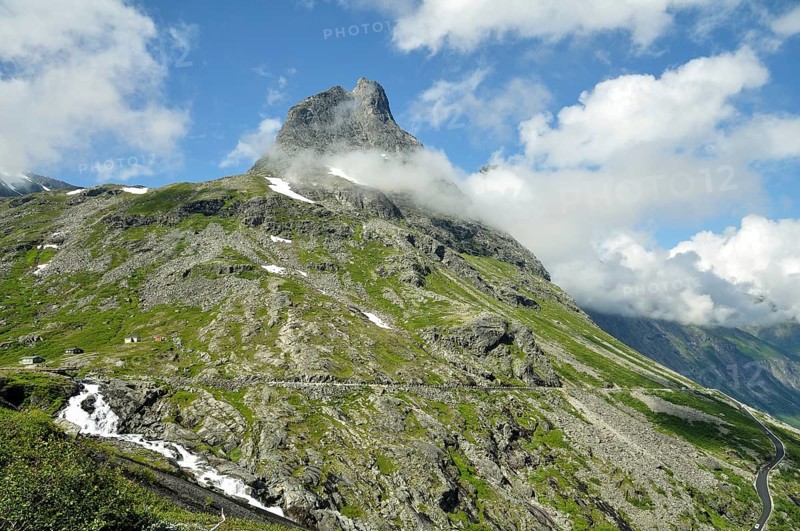 Bispen Mountain above the Trollstigen Road with the Stigfossen waterfall