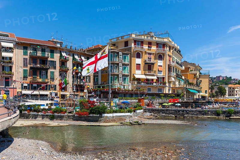 Hotels and sidewalk cafes on the Lungomare Vittorio Veneto at the port of Rapallo