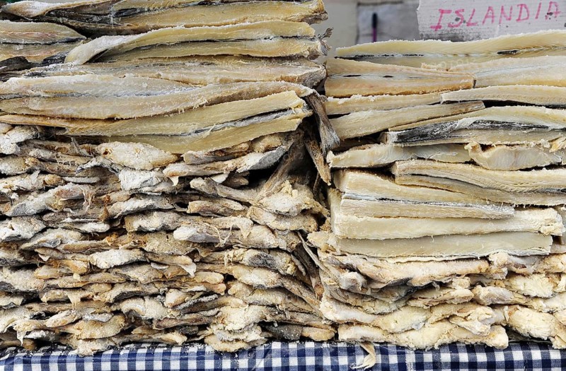 Icelandic salted dried cod stacked in market stall at the annual All Saints Market in Cocentaina